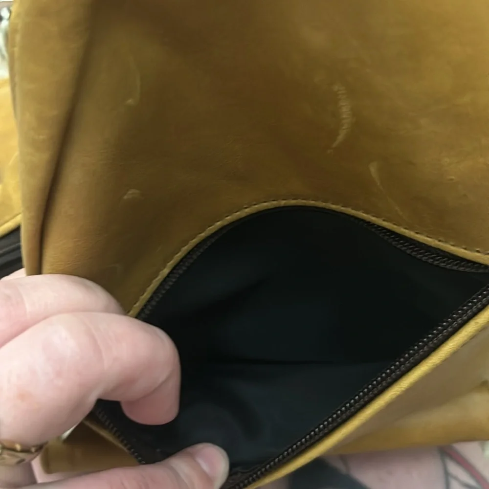 Genuine leather sling backpack